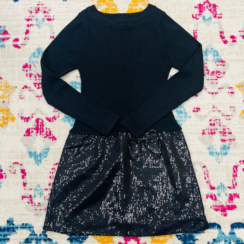 If It Were Me Black Ribbed Sweater on top with black sequined skirt- size M
